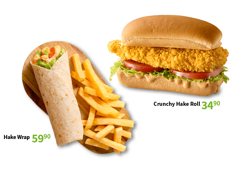 Hake wrap with chips on a wooden board and Crunchy hake roll with tomato and lettuce